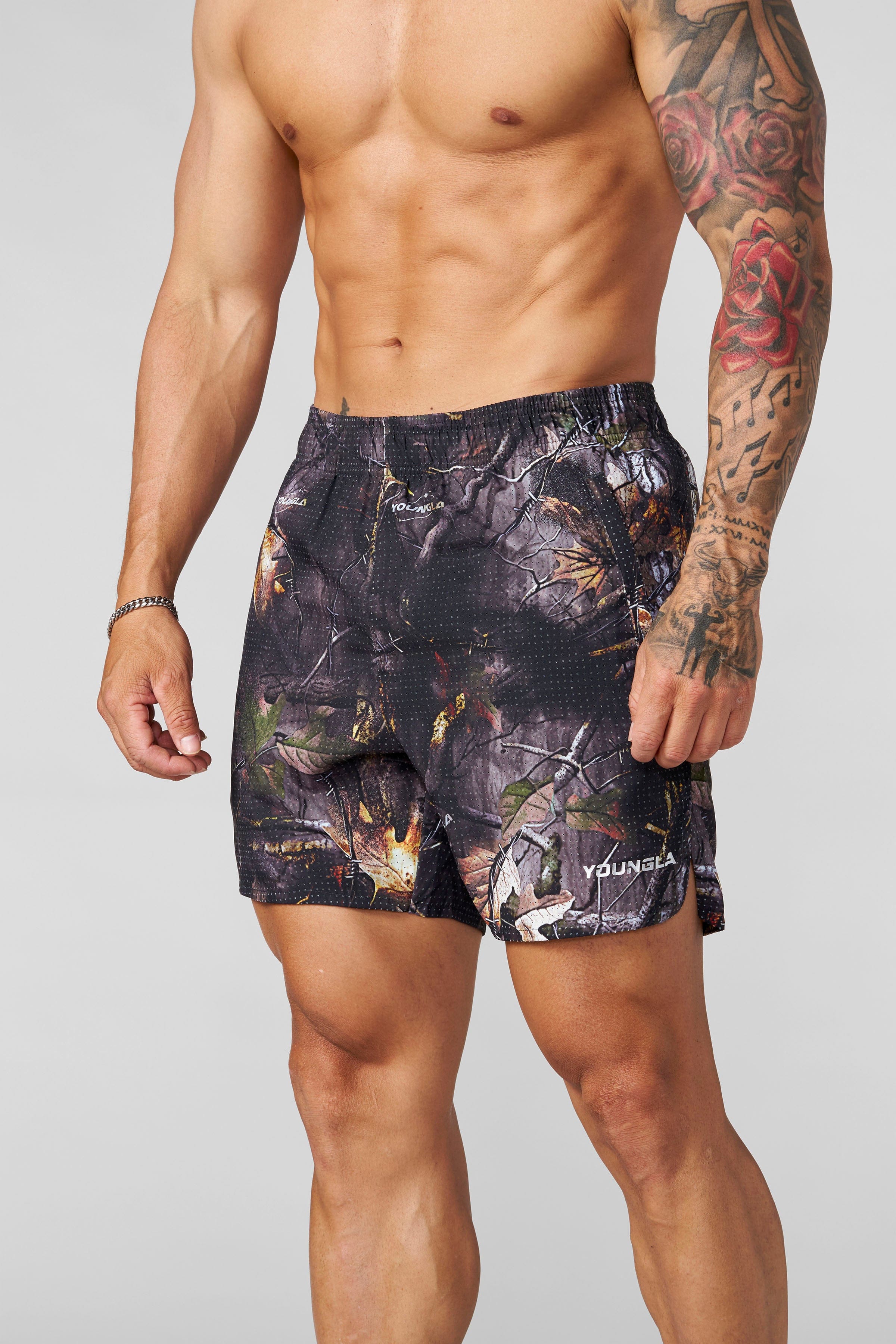 1028 - Weightless Shorts - Black Tree Camo